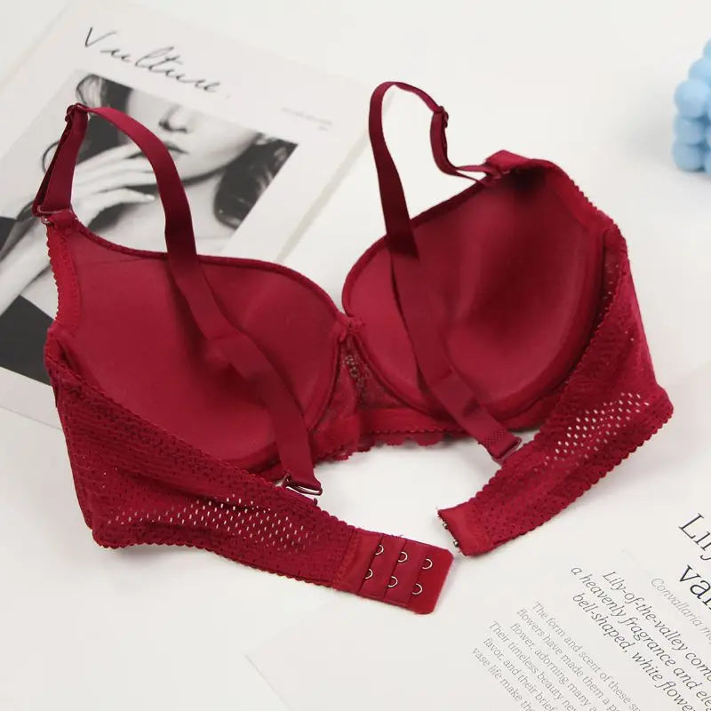 Red bra with lace details on a magazine page